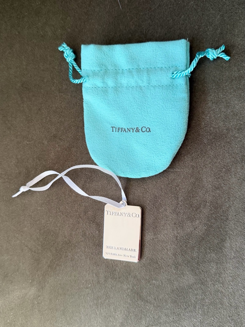 Tiffany & Co. Shopping bag charm with blue pouch